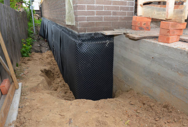 Happy homeowners after waterproofing job in Pittsboro